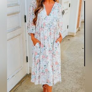 Midi dress, brand new with tags. Never worn.